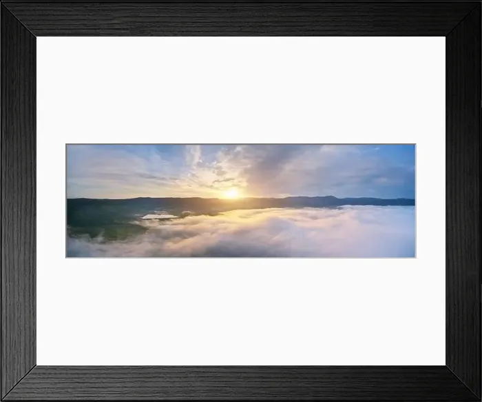 Framed Print : Aerial panorama view white clouds in mountain and blue sky at morning. Top cloudscape view from drone Framed Print : Aerial panorama view white clouds in mountain and blue sky at morning. Top cloudscape view from drone