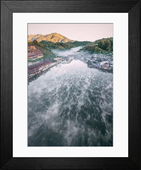 Framed Print : Aerial view of Sunrise with fog over Ban Rak thai, chinese village near a lake in Mae Hong Son, Thailand Framed Print : Aerial view of Sunrise with fog over Ban Rak thai, chinese village near a lake in Mae Hong Son, Thailand