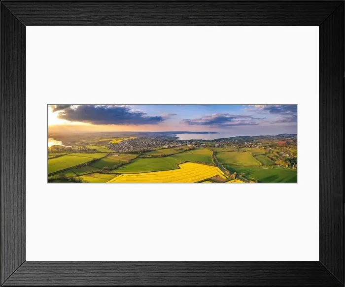 Framed Print : Sunset over Rapeseed fields and Farmlands from a drone, Paignton and Brixham, River Dart, Devon, England Framed Print : Sunset over Rapeseed fields and Farmlands from a drone, Paignton and Brixham, River Dart, Devon, England
