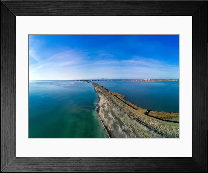 Framed Print : A bird's eye view panorama of a wild sandy dry grass shore washed by a deep calm evening Black sky in Bulgaria Framed Print : A bird's eye view panorama of a wild sandy dry grass shore washed by a deep calm evening Black sky in Bulgaria