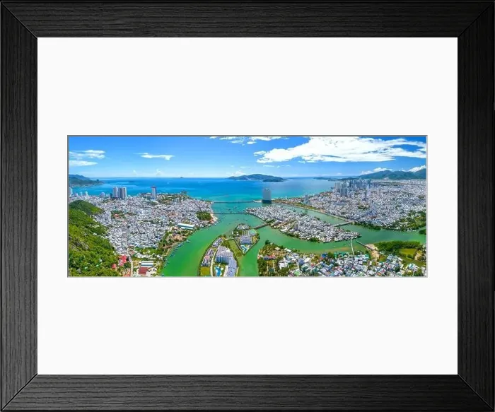 Framed Print : The coastal city of Nha Trang seen from above on a sunny summer afternoon Framed Print : The coastal city of Nha Trang seen from above on a sunny summer afternoon