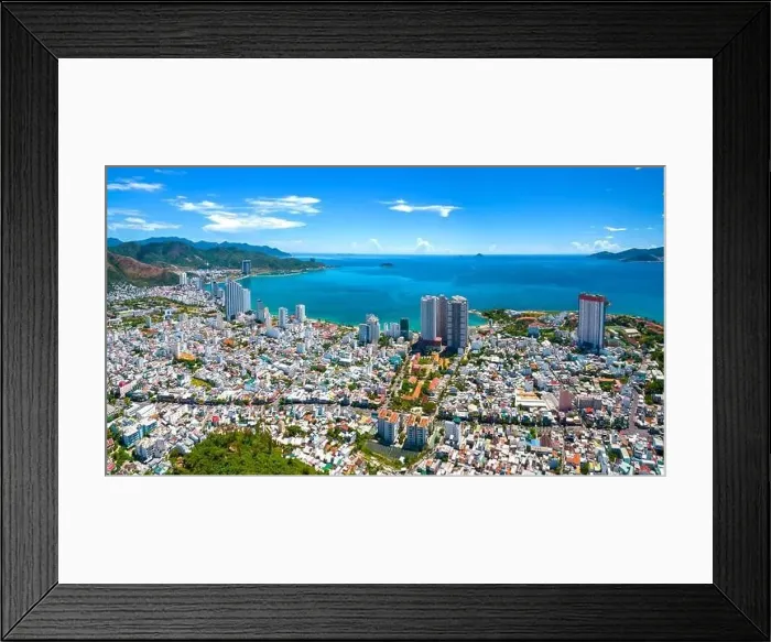 Framed Print : The coastal city of Nha Trang seen from above on a sunny summer afternoon Framed Print : The coastal city of Nha Trang seen from above on a sunny summer afternoon