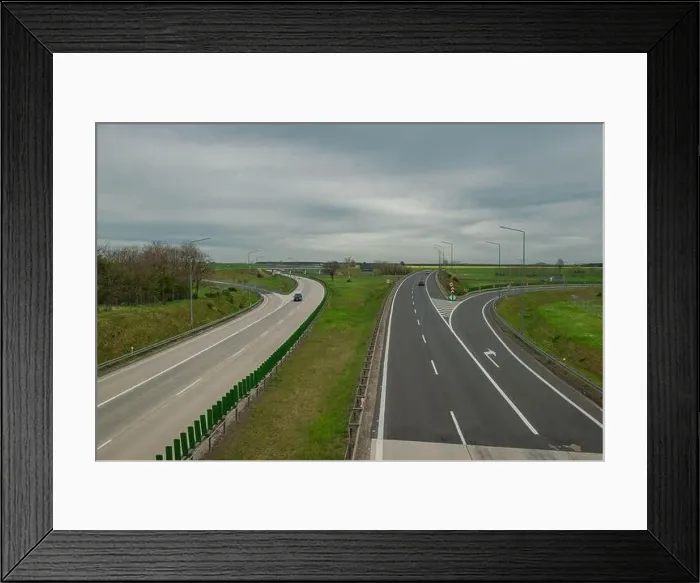 Framed Print : A large road junction in a vast plain. View from a great height. Photo from the drone Framed Print : A large road junction in a vast plain. View from a great height. Photo from the drone