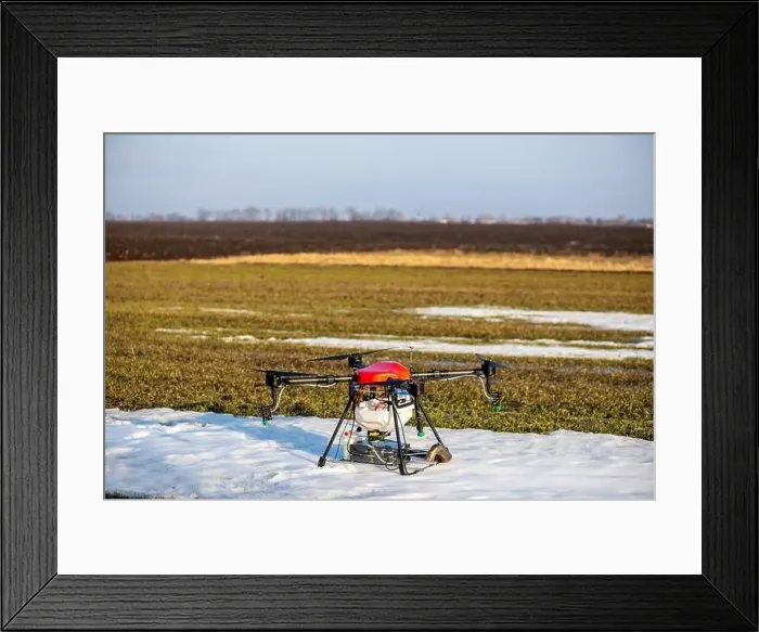 Framed Print : A beautiful red agrodron stands on the field Framed Print : A beautiful red agrodron stands on the field