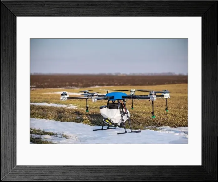 Framed Print : A beautiful blue agrodron stands on the field Framed Print : A beautiful blue agrodron stands on the field