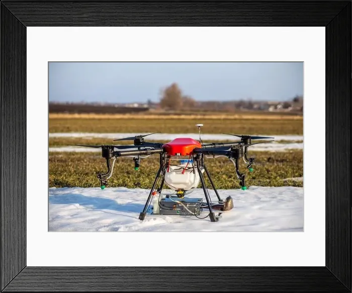 Framed Print : A beautiful red agrodron stands on the field Framed Print : A beautiful red agrodron stands on the field