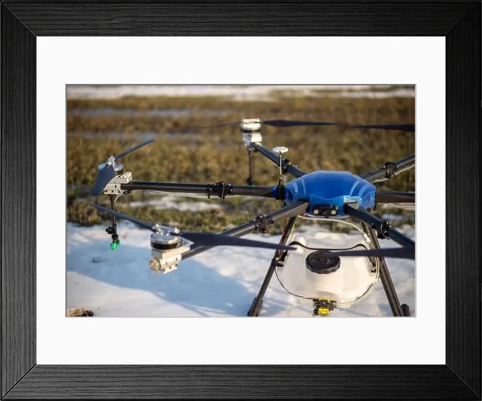 Framed Print : A beautiful blue agrodron stands on the field Framed Print : A beautiful blue agrodron stands on the field