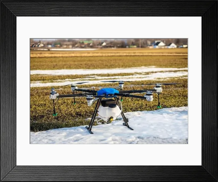 Framed Print : A beautiful blue agrodron stands on the field Framed Print : A beautiful blue agrodron stands on the field
