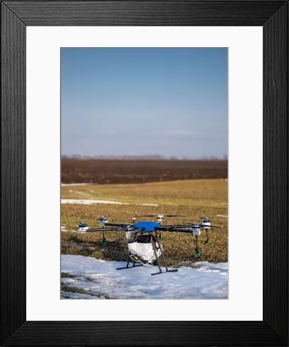 Framed Print : A beautiful blue agrodron stands on the field Framed Print : A beautiful blue agrodron stands on the field
