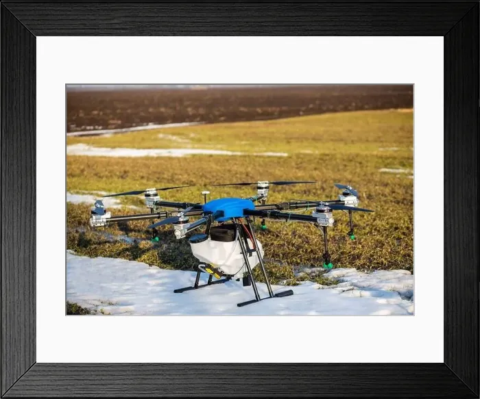 Framed Print : A beautiful blue agrodron stands on the field Framed Print : A beautiful blue agrodron stands on the field