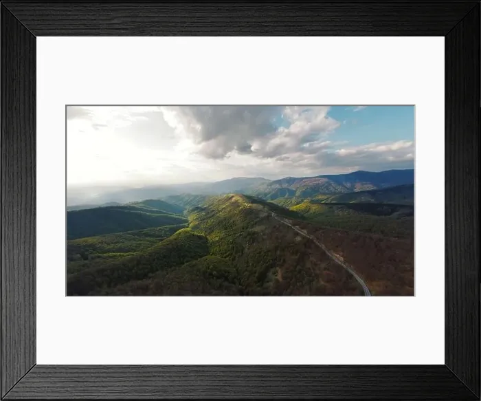 Framed Print : High angle aerial view drone image of sunset sun rays trough the trees Framed Print : High angle aerial view drone image of sunset sun rays trough the trees