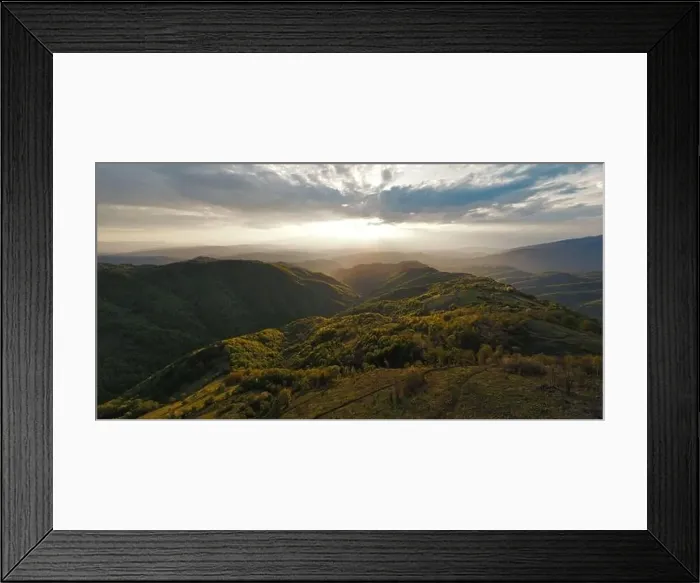 Framed Print : High angle aerial view drone image of sunset sun rays trough the trees Framed Print : High angle aerial view drone image of sunset sun rays trough the trees