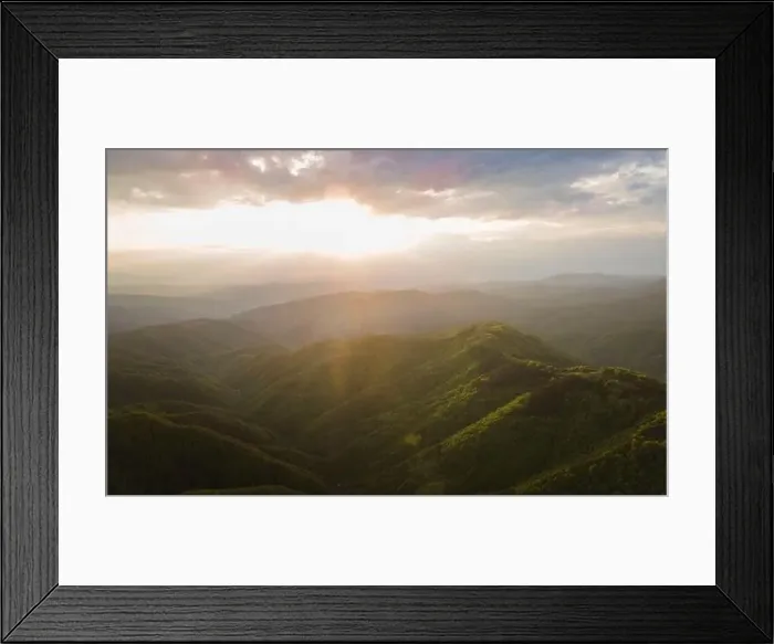 Framed Print : High angle aerial view drone image of sunset sun rays trough the trees Framed Print : High angle aerial view drone image of sunset sun rays trough the trees
