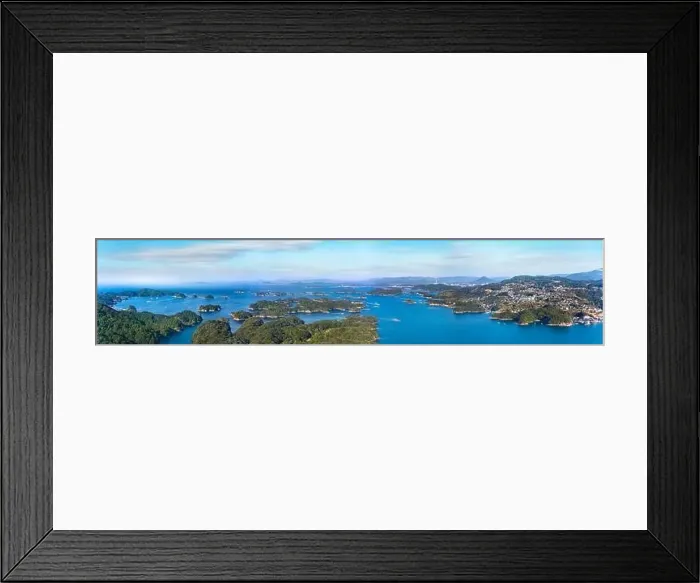 Framed Print : Long exposure photography of a panorama bird's-eye view of the Kujūkushima seascape with islands that lie off sasebo Framed Print : Long exposure photography of a panorama bird's-eye view of the Kujūkushima seascape with islands that lie off sasebo