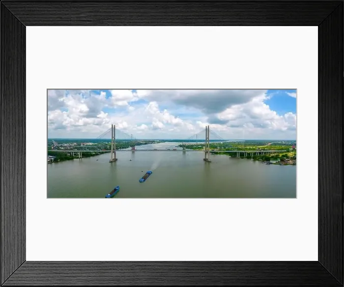 Framed Print : My Thuan bridge, Vinh Long city, Vietnam, aerial view. My Thuan bridge is famous bridge in mekong delta, Vietnam Framed Print : My Thuan bridge, Vinh Long city, Vietnam, aerial view. My Thuan bridge is famous bridge in mekong delta, Vietnam