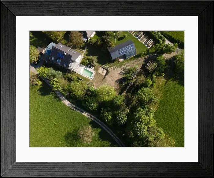 Framed Print : Drone flight over pool in the middle of greenery, fresh grass grown and the pool is not yet cleaned Framed Print : Drone flight over pool in the middle of greenery, fresh grass grown and the pool is not yet cleaned