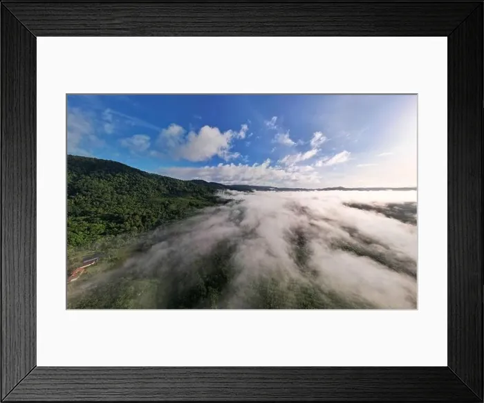 Framed Print : Aerial view Panorama of flowing fog waves on mountain tropical rainforest