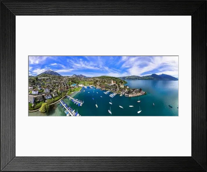 Framed Print : Stunning aerial drone panorama of lake Thun and the Spiez village with medieval castle Framed Print : Stunning aerial drone panorama of lake Thun and the Spiez village with medieval castle