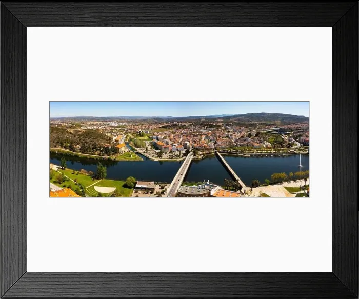 Framed Print : Panorama of Mirandela cityscape on banks of Tua river, Portugal Framed Print : Panorama of Mirandela cityscape on banks of Tua river, Portugal