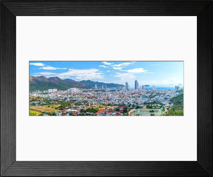 Framed Print : The coastal city of Nha Trang seen from above on a sunny summer afternoon Framed Print : The coastal city of Nha Trang seen from above on a sunny summer afternoon