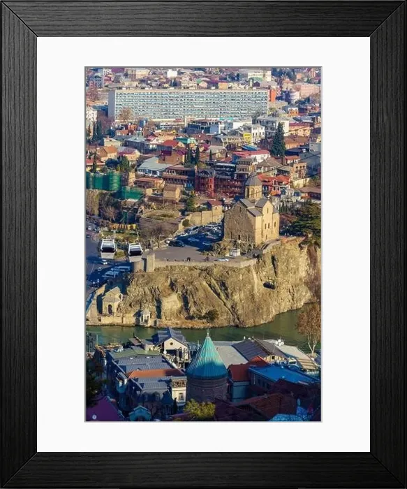Framed Print : The Metekhi temple, which is picturesquely located on a rock above the Kura river Framed Print : The Metekhi temple, which is picturesquely located on a rock above the Kura river