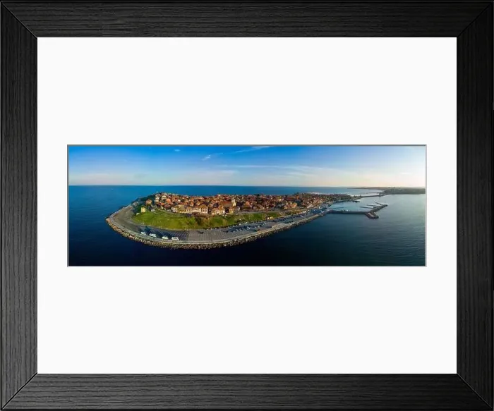 Framed Print : Bird's eye view panorama of the small spring green town of Nessebar with historic ancient European houses Framed Print : Bird's eye view panorama of the small spring green town of Nessebar with historic ancient European houses