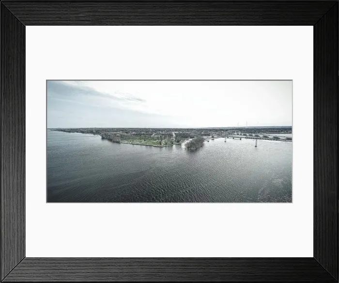 Framed Print : A view of the river in Green Bay looking towards the park with a gray graphite theme apllied. Springtime Framed Print : A view of the river in Green Bay looking towards the park with a gray graphite theme apllied. Springtime
