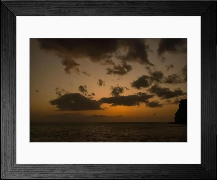 Framed Print : A Beautiful sunset on the Atlantic Ocean off the coast of Madeira island, Portugal, seen from Calheta Framed Print : A Beautiful sunset on the Atlantic Ocean off the coast of Madeira island, Portugal, seen from Calheta