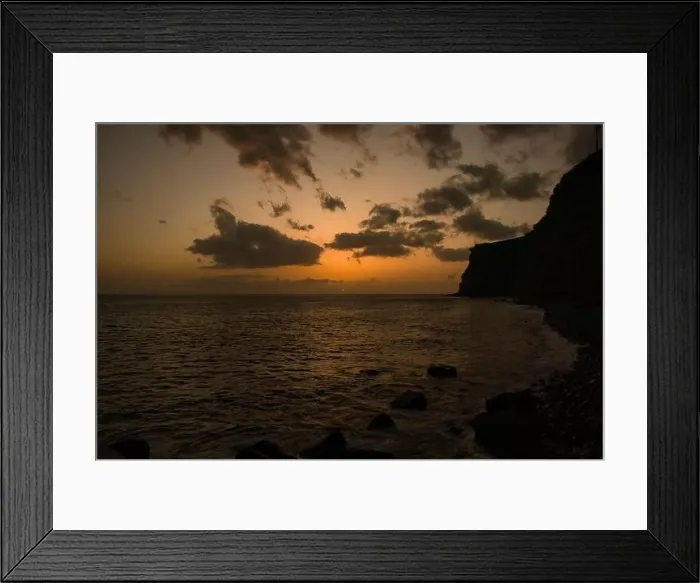 Framed Print : A Beautiful sunset on the Atlantic Ocean off the coast of Madeira island, Portugal, seen from Calheta Framed Print : A Beautiful sunset on the Atlantic Ocean off the coast of Madeira island, Portugal, seen from Calheta