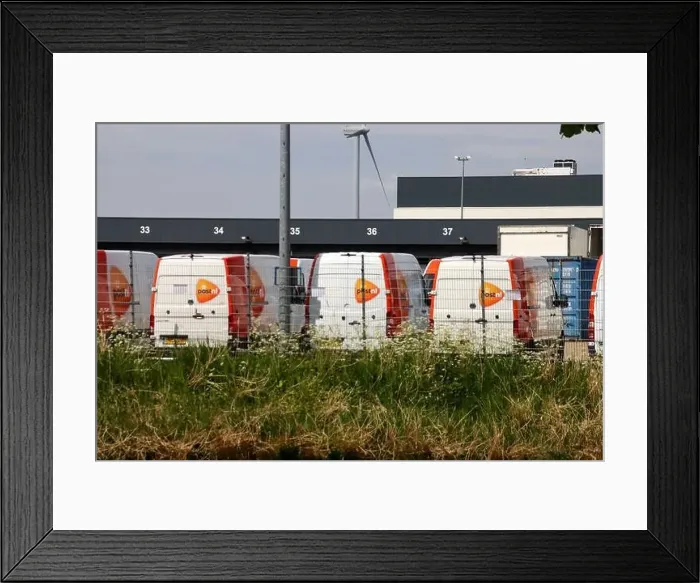 Framed Print : Buses of the PostNL parcel delivery service in Waddinxveen at Doelwijk in the Netherlands Framed Print : Buses of the PostNL parcel delivery service in Waddinxveen at Doelwijk in the Netherlands