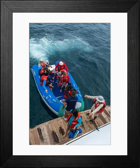Framed Print : Tourist on inflatable boats, Santa Fe Island, Galapagos islands. Ecuador