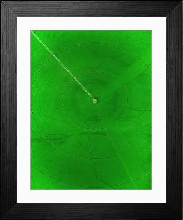 Framed Print : Aerial view from a drone flying above a green farm field growing crops growth with irrigation pivot sprinklers