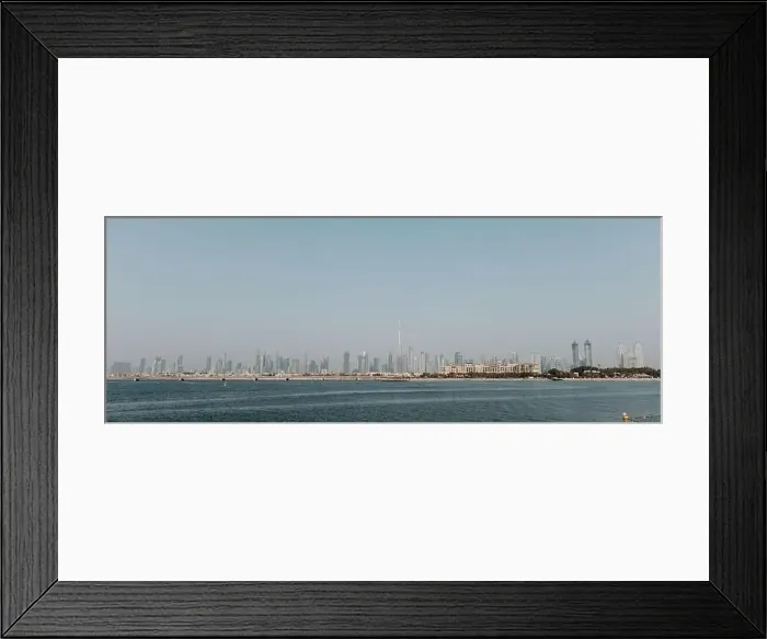 Framed Print : Dubai downtown city landscape view with sea in the front Framed Print : Dubai downtown city landscape view with sea in the front