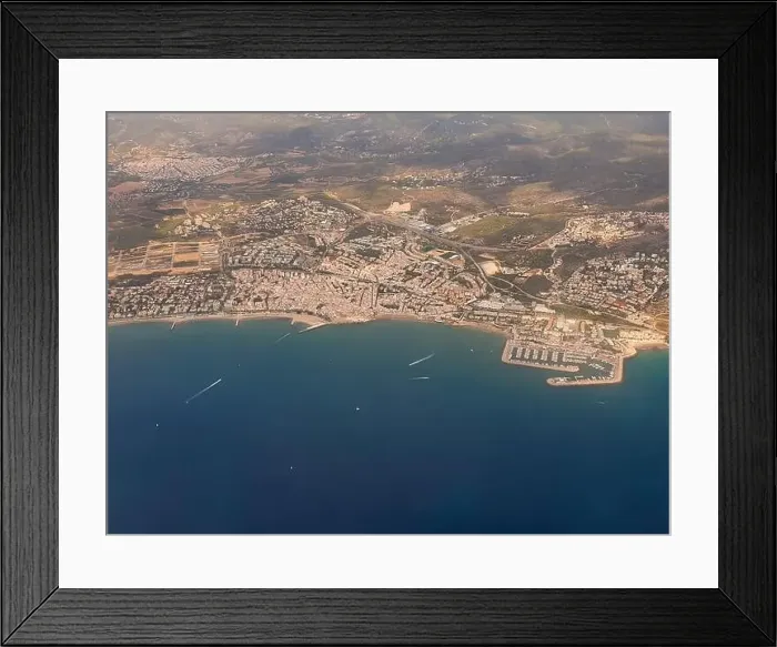 Framed Print : Aerial view on beautiful Sitges town in summer, Spain, view from the plain Framed Print : Aerial view on beautiful Sitges town in summer, Spain, view from the plain