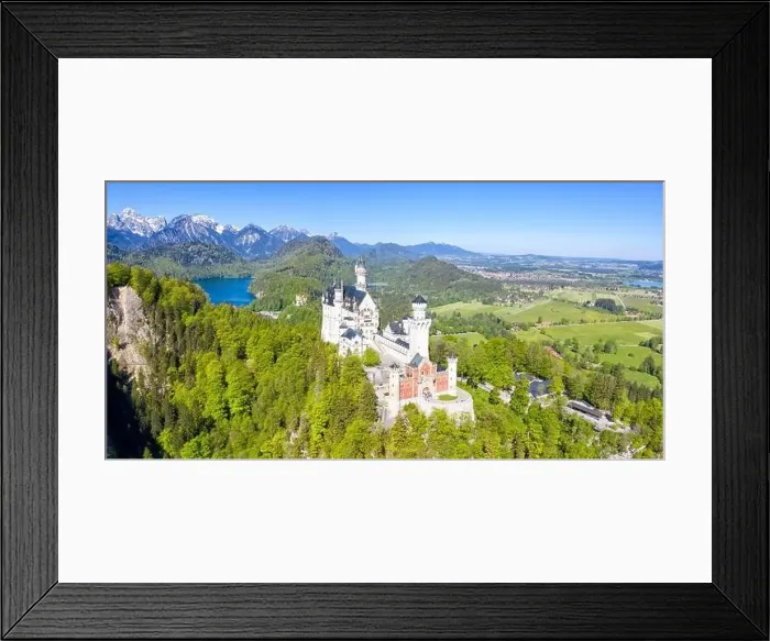 Framed Print : Schloss Neuschwanstein castle aerial view Alps landscape travel panorama palace in Bavaria Germany Framed Print : Schloss Neuschwanstein castle aerial view Alps landscape travel panorama palace in Bavaria Germany