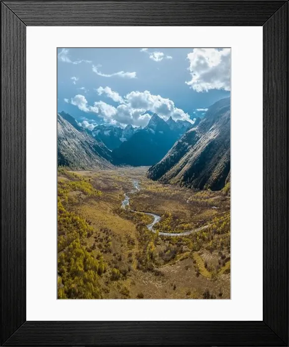 Framed Print : Autumn lifeless valley with a river in the center and mountains on the horizon Framed Print : Autumn lifeless valley with a river in the center and mountains on the horizon