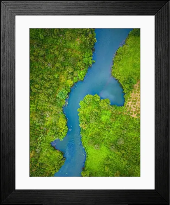 Framed Print : Aerial landscape of winding clear blue river in green field Framed Print : Aerial landscape of winding clear blue river in green field