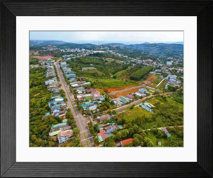 Framed Print : Aerial view of National Route 14 in Kien Duc town Framed Print : Aerial view of National Route 14 in Kien Duc town