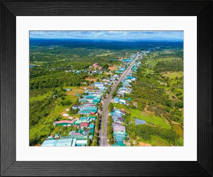 Framed Print : Aerial view of National Route 14 in Kien Duc town Framed Print : Aerial view of National Route 14 in Kien Duc town