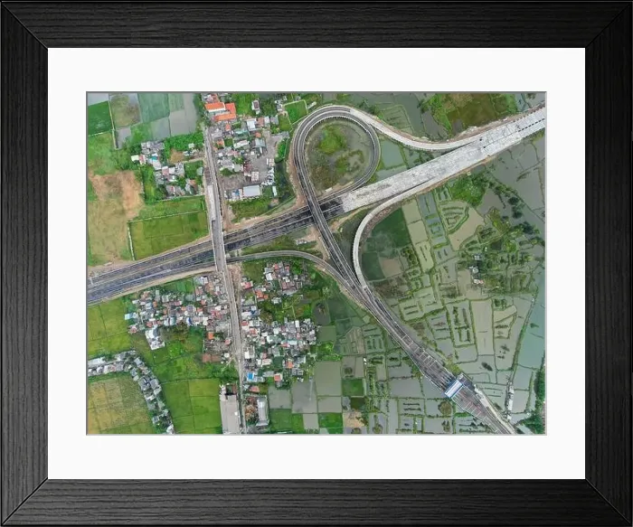 Framed Print : Aerial view on the new road construction site at Tarumajaya Bekasi. Bekasi, Indonesia, June 15, 2022 Framed Print : Aerial view on the new road construction site at Tarumajaya Bekasi. Bekasi, Indonesia, June 15, 2022