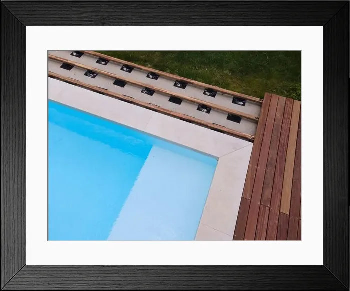 Framed Print : Drone flight over beautiful green garden with pool and the wooden terrace of the pool is currently in progress Framed Print : Drone flight over beautiful green garden with pool and the wooden terrace of the pool is currently in progress