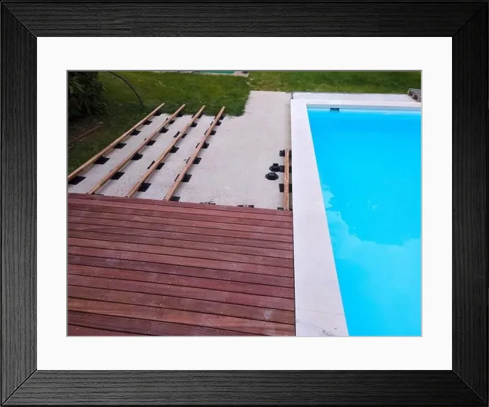 Framed Print : Drone flight over beautiful green garden with pool and the wooden terrace of the pool is currently in progress Framed Print : Drone flight over beautiful green garden with pool and the wooden terrace of the pool is currently in progress