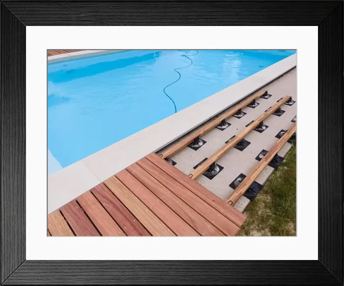Framed Print : aerial drone flight over beautiful green garden with pool and the wooden deck of the pool is in progress Framed Print : aerial drone flight over beautiful green garden with pool and the wooden deck of the pool is in progress