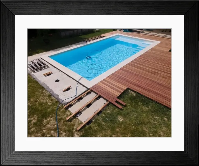 Framed Print : aerial drone flight over beautiful green garden with pool and the wooden deck of the pool is in progress Framed Print : aerial drone flight over beautiful green garden with pool and the wooden deck of the pool is in progress