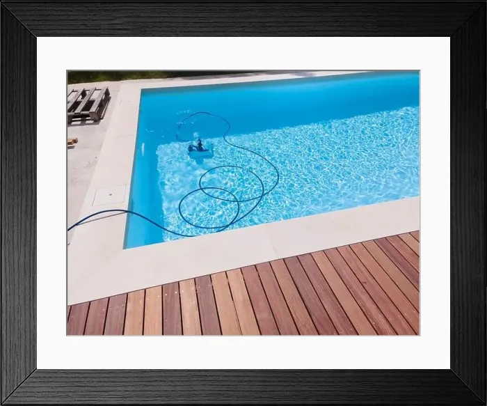 Framed Print : aerial drone flight over beautiful green garden with pool and the wooden deck of the pool is in progress Framed Print : aerial drone flight over beautiful green garden with pool and the wooden deck of the pool is in progress