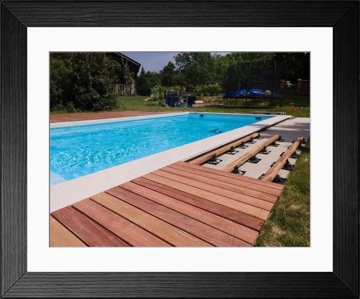 Framed Print : aerial drone flight over beautiful green garden with pool and the wooden deck of the pool is in progress Framed Print : aerial drone flight over beautiful green garden with pool and the wooden deck of the pool is in progress