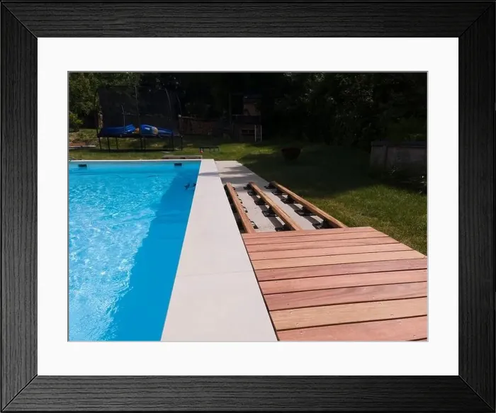 Framed Print : aerial drone flight over beautiful green garden with pool and the wooden deck of the pool is in progress Framed Print : aerial drone flight over beautiful green garden with pool and the wooden deck of the pool is in progress