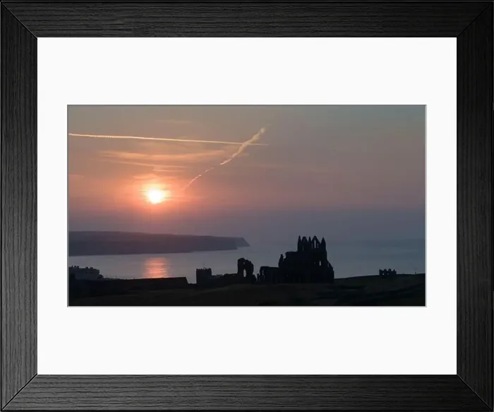 Framed Print : Drone shot of a sunset over Whitby Abbey, North Yorkshire Framed Print : Drone shot of a sunset over Whitby Abbey, North Yorkshire