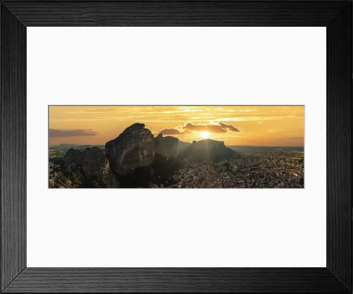 Framed Print : Meteora Greece panorama. Sunset and orange sky over Kalabaka town. Rock formations landscape, Europe travel destination Framed Print : Meteora Greece panorama. Sunset and orange sky over Kalabaka town. Rock formations landscape, Europe travel destination