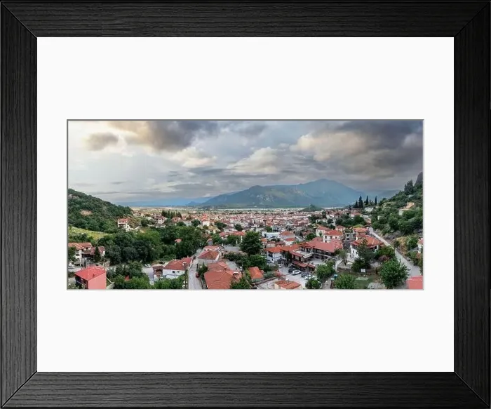 Framed Print : Kalambaka Greece. Sky with heavy clouds over Kalabaka town buildings and valley Framed Print : Kalambaka Greece. Sky with heavy clouds over Kalabaka town buildings and valley